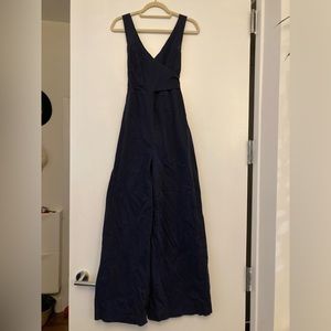 Navy Anthropologie Wrap Top Jumpsuit with some pockets!